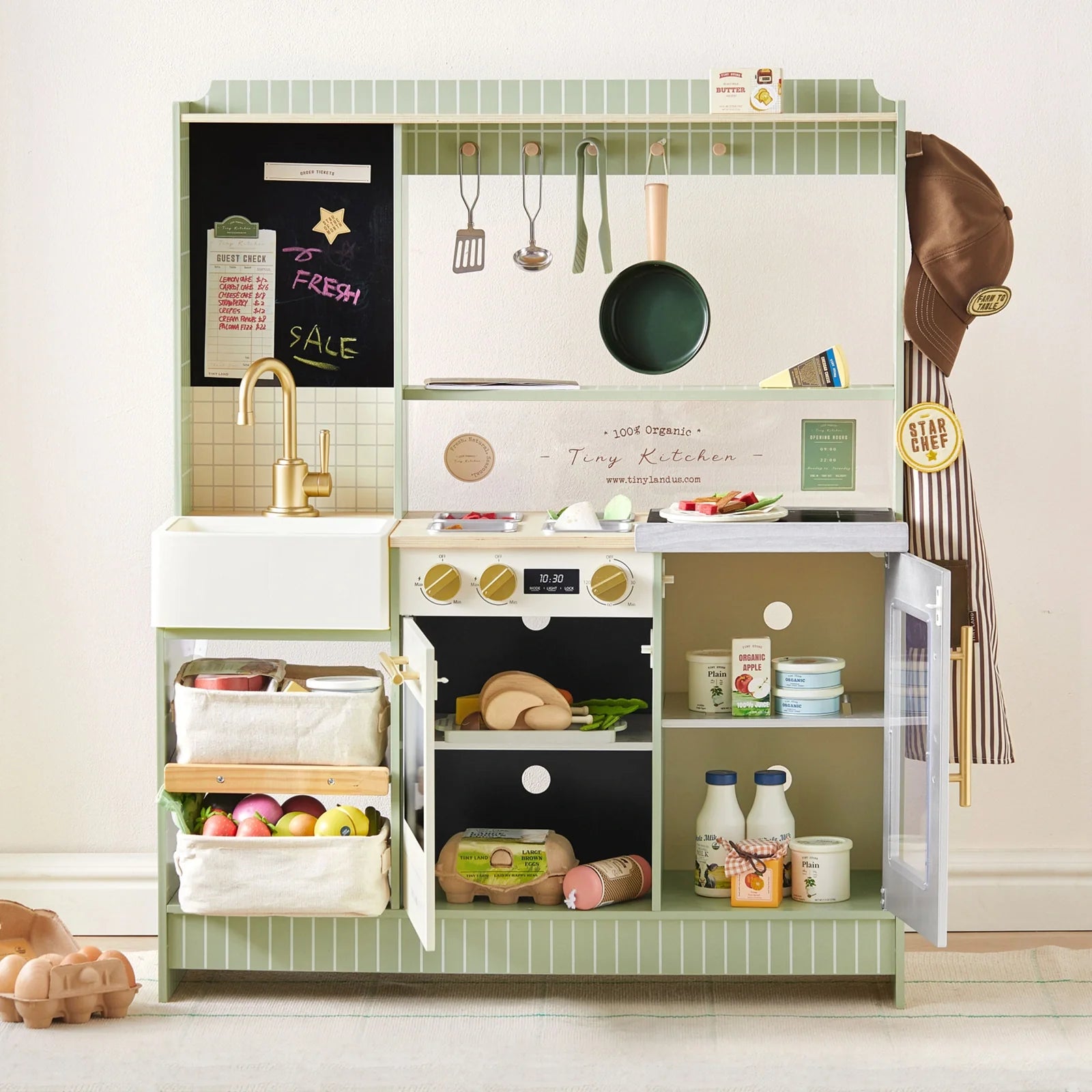What to Expect Features Tiny Land’s BistroSwitch Play Kitchen for Its Thoughtful Approach to Pretend Play