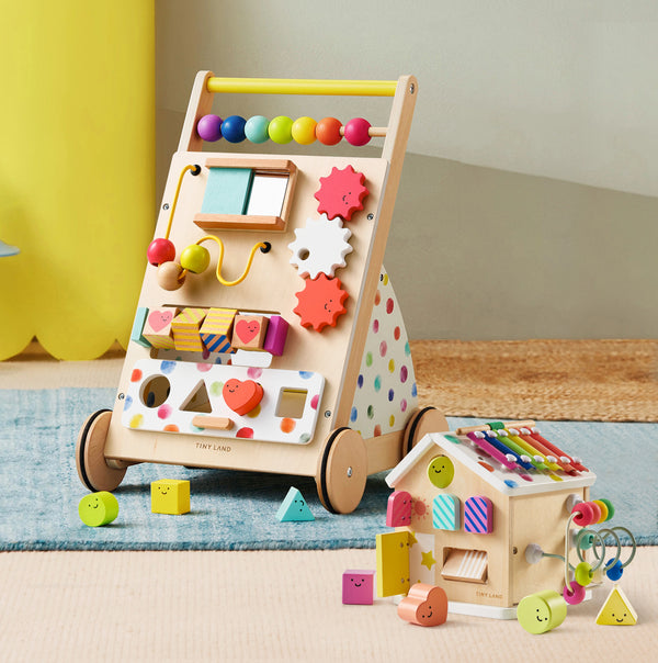 Tiny Land Rainbow Baby Walker & Activity Cube Developmental Playset featuring a natural wooden baby walker with a bead maze, gears, and shape sorter, alongside a matching house-shaped activity cube with a xylophone top.