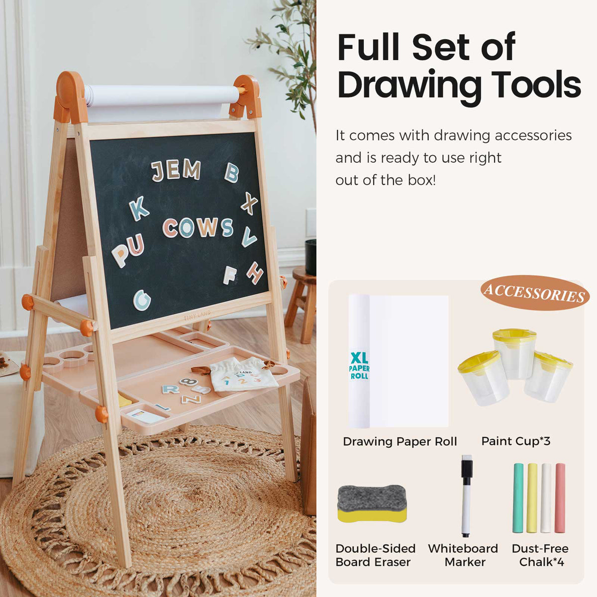 The Tiny Land® Magnitales Easel for Kids by Tiny Land, with a chalkboard, magnetic letters, and drawing paper roll, stands on a round jute rug. Included accessories: paint cups, whiteboard marker, dust-free chalk, and eraser.