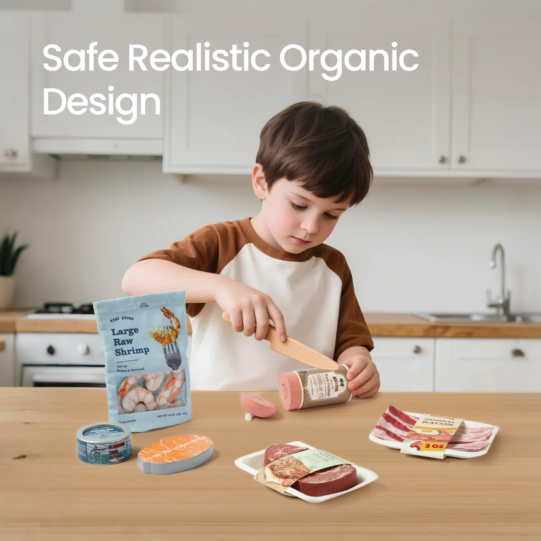 A young boy in the kitchen plays with Tiny Land® Organic Meat & Seafood Pack by Tiny Land INC, featuring wooden shrimp, canned fish, salmon, steak, sausage, and bacon. He pretends to cut sausage with a wooden knife. Safe Realistic Organic Design is displayed.