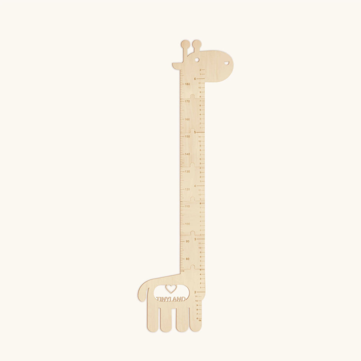 The Tiny Land® Growth Chart by Tiny Land is a wooden giraffe-shaped ruler marked with measurements and Tinyland at the base—ideal as a growth chart or playful kids’ room wall decor, featuring the giraffe’s head at the top and legs at the bottom.
