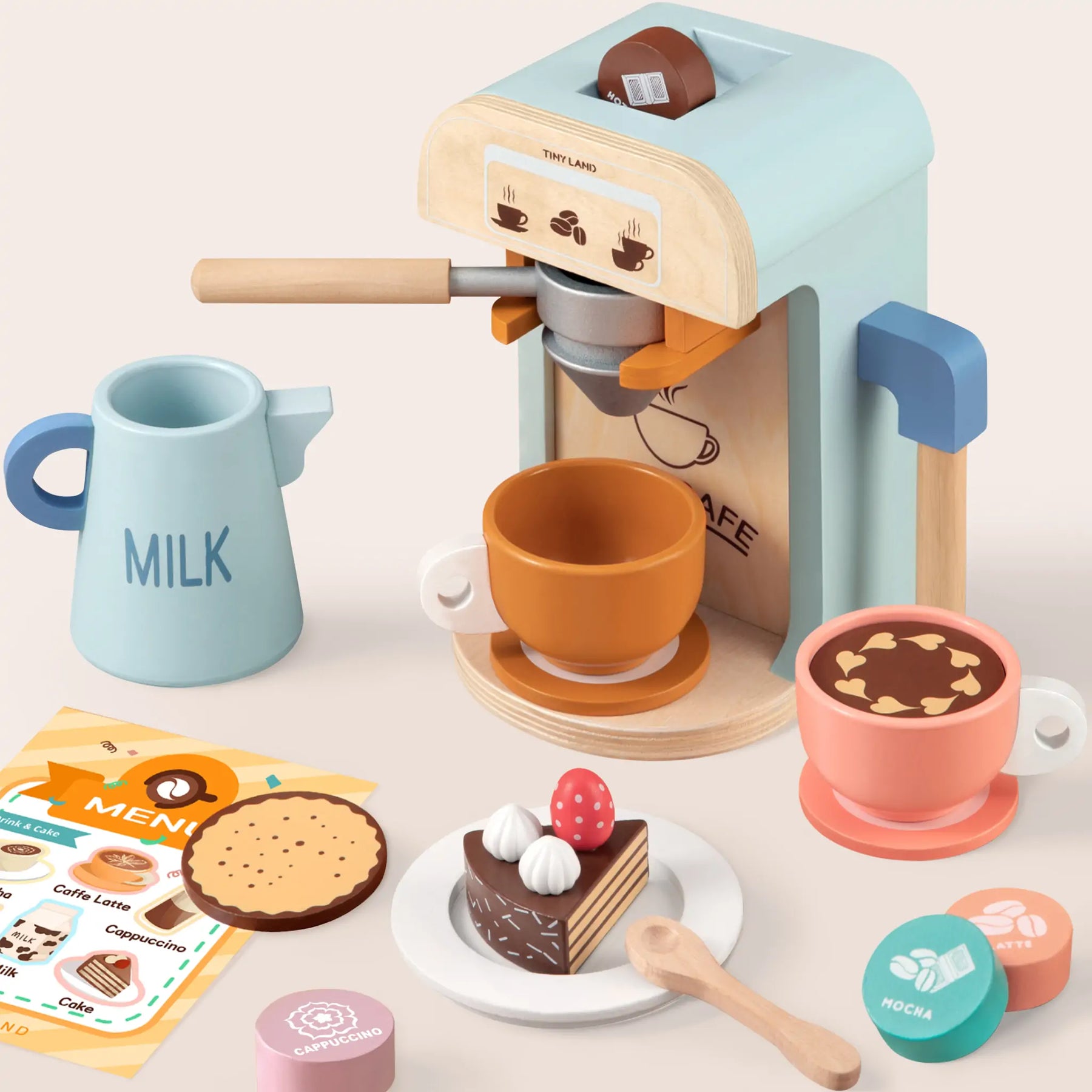 The Tiny Land® Play Kitchen Accessories – Children’s Coffee Maker set includes a wooden coffee maker, two cups, milk jug, menu, biscuits, cakes, and coffee tokens in pastel colors—perfect kids kitchen toys by Tiny Land.