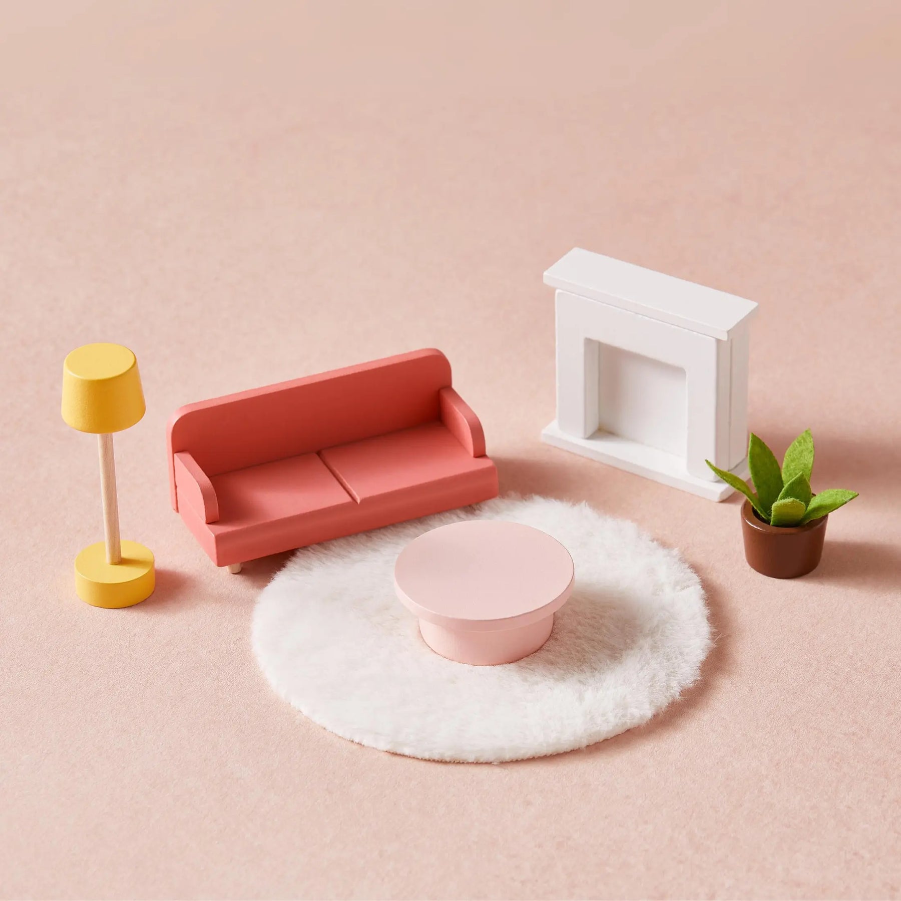 The Tiny Land® Sweetwood Love Dollhouse without Dolls features a pink sofa, round coffee table, white rug, yellow floor lamp, fireplace, and potted plant—perfect dollhouse furniture for imaginative play by Tiny Land.