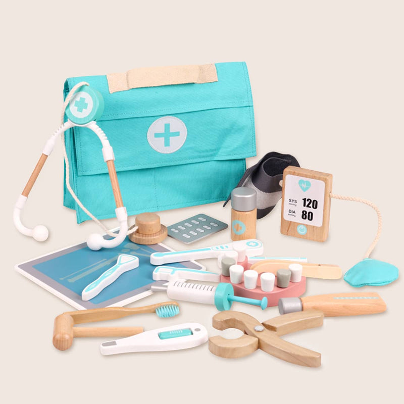 The Tiny Land® Mystery Surprise Box includes a premium toy doctor kit with teal and wooden tools like a stethoscope, blood pressure cuff, syringe, and medical bag—ideal as a surprise gift from Tiny Land for an exciting unboxing experience.