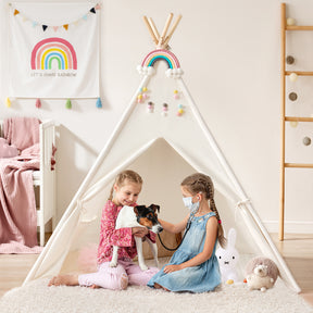 Two young girls sit together inside the Tiny Land® Ultimate Reading Retreat: Premium Teepee & Corduroy Lounger by Tiny Land INC. One girl cuddles a dog while the other, wearing a mask, reaches out to gently pet it. Surrounded by toys and pastel accents, this bright room becomes a delightful Montessori-inspired nook—ideal for play and reading.|Soft Teal
