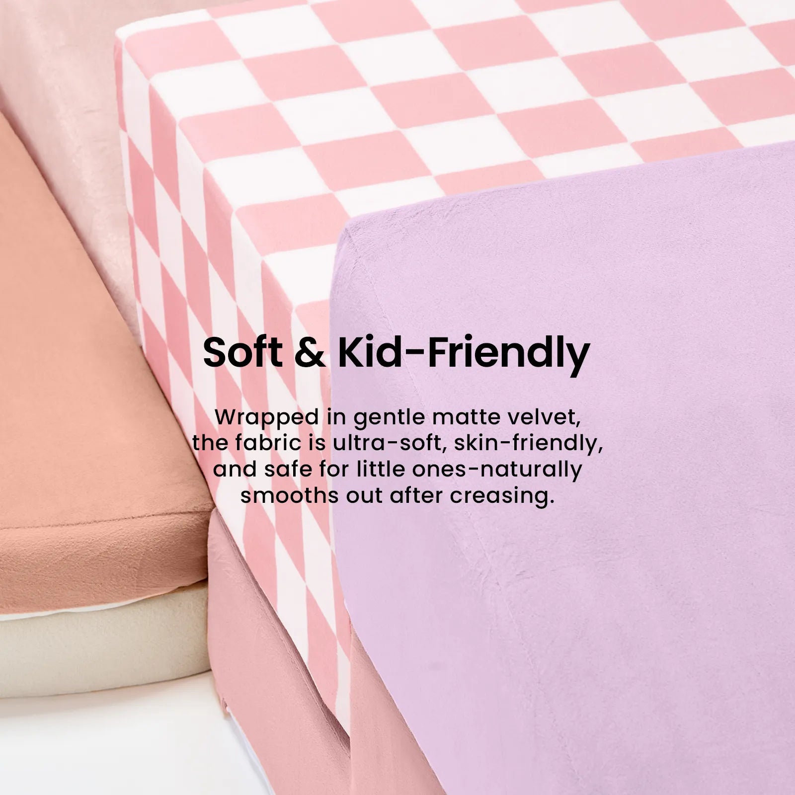 A stack of lavender, peach, and checkered foam Tiny Land® Violet PlayNest Climbing Blocks for a play corner, described as soft, kid-friendly, and featuring durable, easy-to-clean fabric.