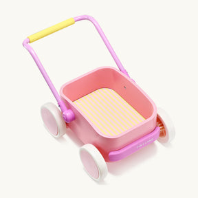 The Tiny Land® 3-in-1 Wooden Baby Walker Wagon - Pink features a pink and yellow design, white wheels, a striped base, a purple handle with yellow grip, solid sides, and the Tiny Land brand displayed on the front.