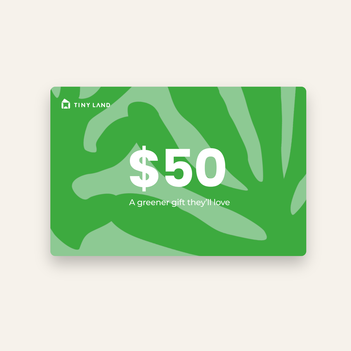 A $50 Tiny Land® Gift Card from Tiny Land, featuring a green leafy background with the message "A greener gift they'll love" in white.