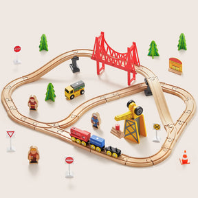 Tiny Land® Wooden Track Trains by Tiny Land INC includes tracks, a red suspension bridge, trees, signs, vehicles, people, a yellow crane, and a red and blue train. Compatible with major brands for endless educational fun.
