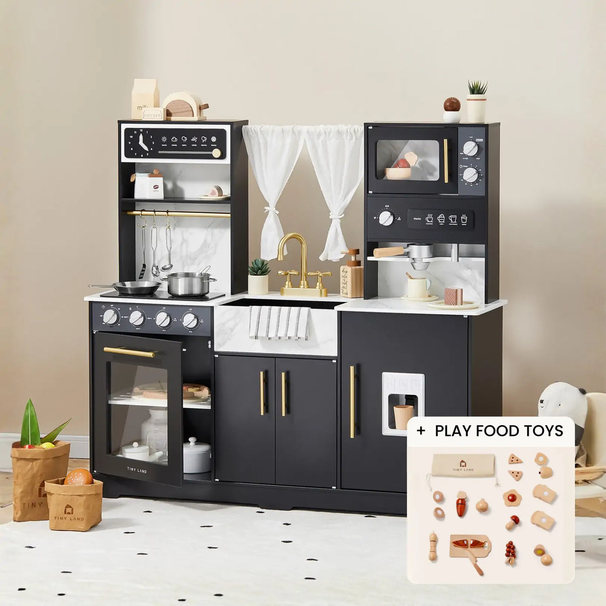 The Tiny Land® Versatile Black Kitchen Play Set by Tiny Land features a black and white wooden design with a sink, oven, stove, microwave, shelves, pots, play food toys, and accessories for hours of pretend kitchen fun.
