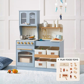 The Tiny Land® Smart Storage Kitchen Cooking Set by Tiny Land is a blue and white wooden play kitchen featuring toy appliances, shelves, utensils, storage bins, and assorted play food toys with a wooden coffee maker set.