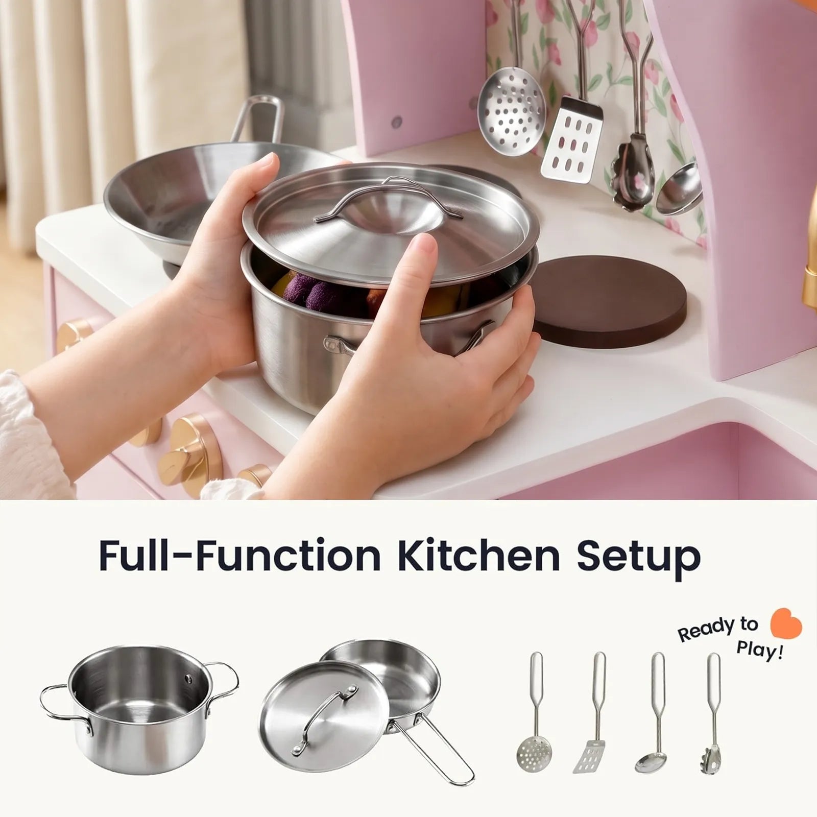 A pair of hands places a metal pot with a lid onto the Tiny Land® Wooden Play Kitchen with Storage for Creative Toddlers, surrounded by an assortment of pretend cookware and miniature utensils—a delightful setup from Tiny Land, ideal for sparking imaginative play.|Sakura Pink
