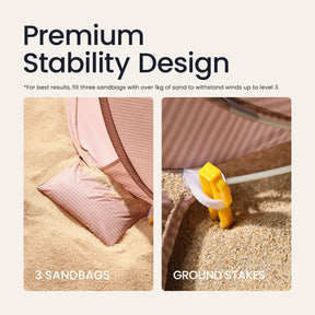 Two close-up images show the Tiny Land® One-Stop Beach Toy & Tent Set – Blush Pink with UV protection, secured by sandbags and yellow stakes. Text highlights its Premium Stability Design and tips for anchoring in windy conditions.