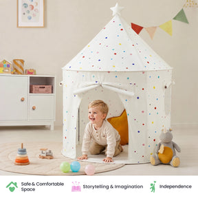 A toddler smiles while crawling out of a white Tiny Land® Kids Tent decorated with colorful polka dots, creating a cozy reading nook.|Colorful Dots