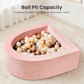 The Tiny Land® PlayNest Climbing & Ball Pit Set is a pink, semi-circular foam pit with 200 pastel brown, cream, and white balls (3C Certified, safe & non-toxic). Great for sensory play. Text above: Ball Pit Capacity. Brand: Tiny Land.