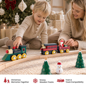 A woman and a young boy sit on a carpet playing with a Tiny Land® Christmas Express Wooden Train Accessory Set, which includes a locomotive, a passenger car with a Santa figure, and miniature Christmas trees.