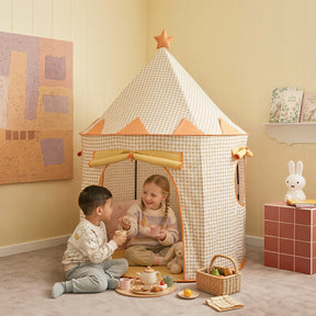 Two children sit on the floor playing with a tea set inside a beige and white gingham Tiny Land® Kids Tent.|Yellow