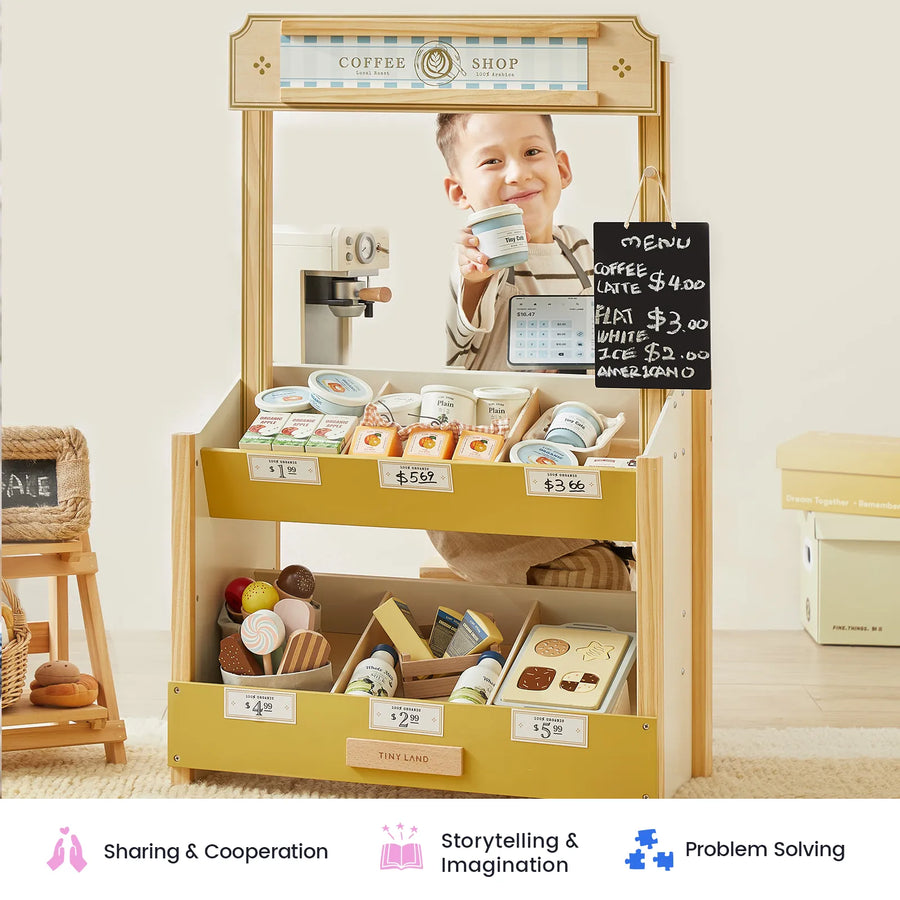 A child smiles and holds a coffee cup at the Tiny Land® Kid’s Grocery Store Playset, surrounded by play food items and a small chalkboard menu. This interactive shopping toy from Tiny Land encourages pretend play as little ones explore their imagination. Icons and text below highlight sharing, problem solving, and creativity—just like in a real grocery store.
