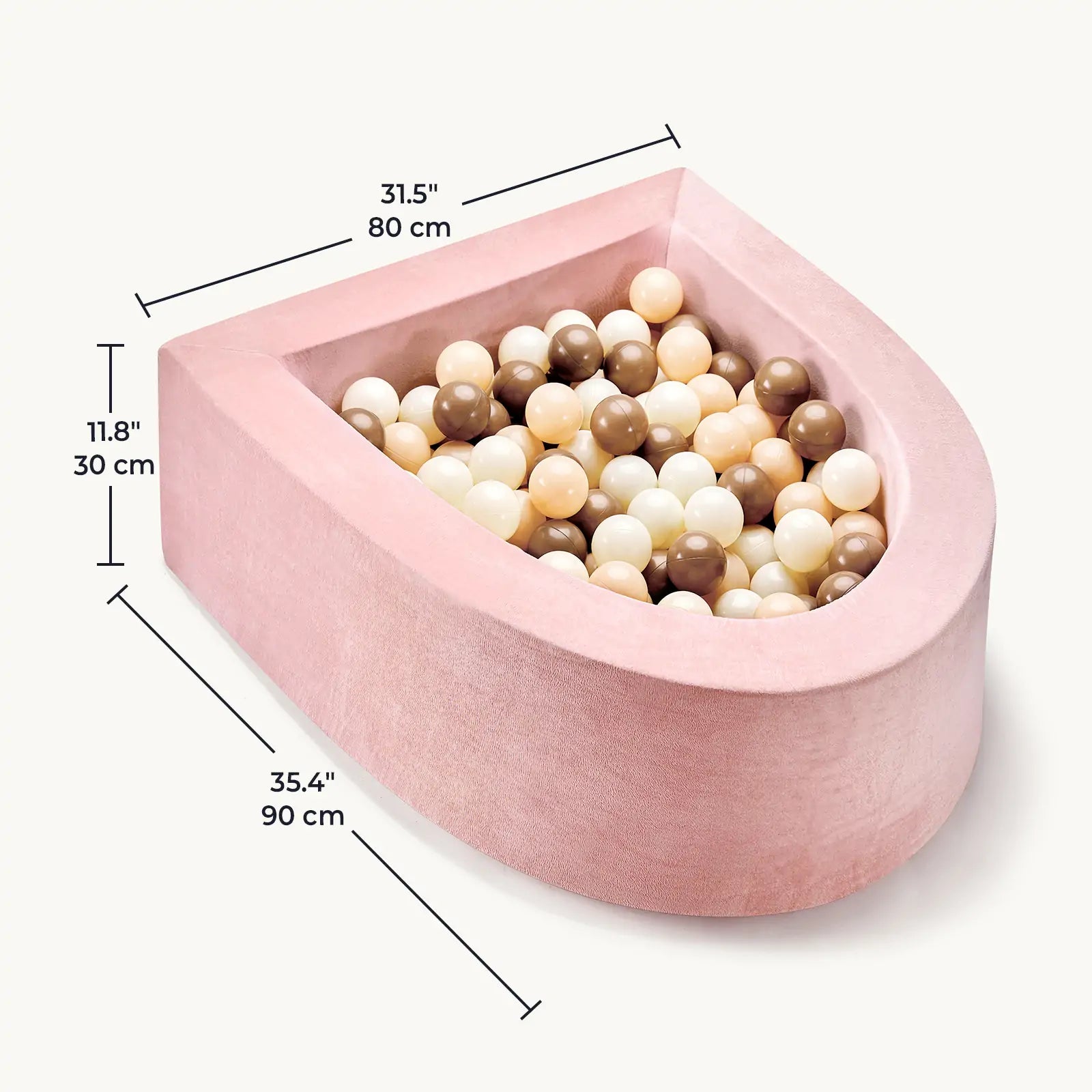 The Tiny Land® PlayNest Ball Pit by Tiny Land features pink velvet, a semi-circular foam design (35.4" x 31.5" x 11.8"), and comes with 200 beige, cream, white, and brown ocean balls—perfect for a cozy toddler play space.|Pink