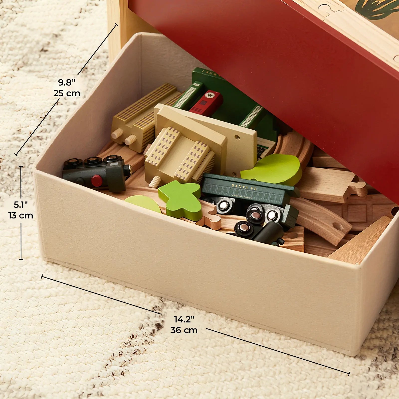 The Tiny Land® 1920 Railway Adventure Train Table by Tiny Land INC comes in a beige box (9.8" x 5.1" x 14.2") and features vintage wooden train tracks, green trees, and classic train cars for nostalgic playtime fun.