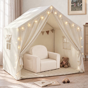 A white fabric Tiny Land Cozy Nook Bundle – Kids Tent with Star Lights featuring a cozy play nook with a GentleSnug Kid Chair and a teddy bear.|Fabric