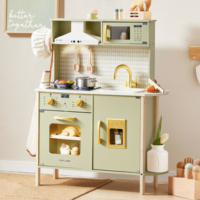The Tiny Land® PopJoy Play Kitchen - Pink / Green by Tiny Land is a pastel green wooden toy kitchen set featuring a pretend stove, oven, sink with faucet, microwave, utensils, and toy food. The words “better together” appear on the wall. This charming and organized play kitchen scene is perfect for inspiring imaginative pretend play in children.|Sage