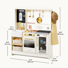 The Tiny Land® BistroSwitch Play Kitchen by Tiny Land is a white kids’ kitchen set with gold accents, featuring a sink, stove, oven, microwave, utensils, storage baskets, food toys, and an apron—perfect for pretend play. Dimensions in inches/centimeters.|White