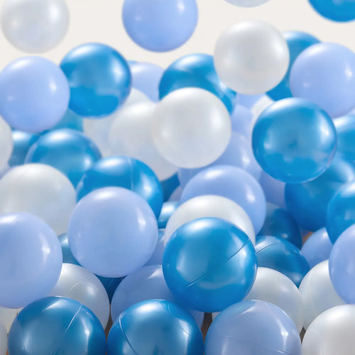 The Tiny Land® Blue Ocean Ball - 200 pcs by Tiny Land features blue, light blue, and white non-toxic play balls closely grouped like a ball pit. Their shiny colors stand out against the neutral background.