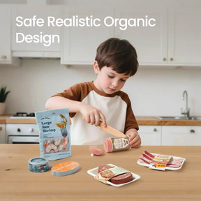 A young boy plays in the kitchen with the Tiny Land® Organic Meat & Seafood Pack, slicing pretend plastic meat, shrimp, and fish with a wooden knife. Text reads: Safe Realistic Organic Design by Tiny Land.
