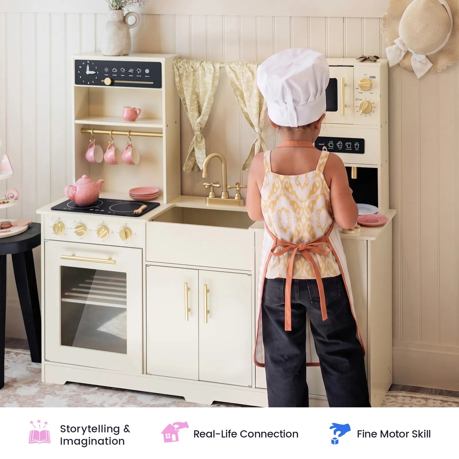 A child wearing a chef hat and apron enjoys imaginative play with the Tiny Land® Iconic Wooden Play Kitchen – Cream Pretend Cooking Set for Kids, pretending to cook just like a real chef. Icons below showcase benefits such as encouraging storytelling, fostering real-life connections, and enhancing fine motor skills—making this Tiny Land kitchen perfect for hours of creative pretend play.