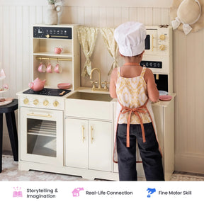 A child wearing a chef hat and apron enjoys imaginative play with the Tiny Land® Iconic Wooden Play Kitchen – Cream Pretend Cooking Set for Kids, pretending to cook just like a real chef. Icons below showcase benefits such as encouraging storytelling, fostering real-life connections, and enhancing fine motor skills—making this Tiny Land kitchen perfect for hours of creative pretend play.