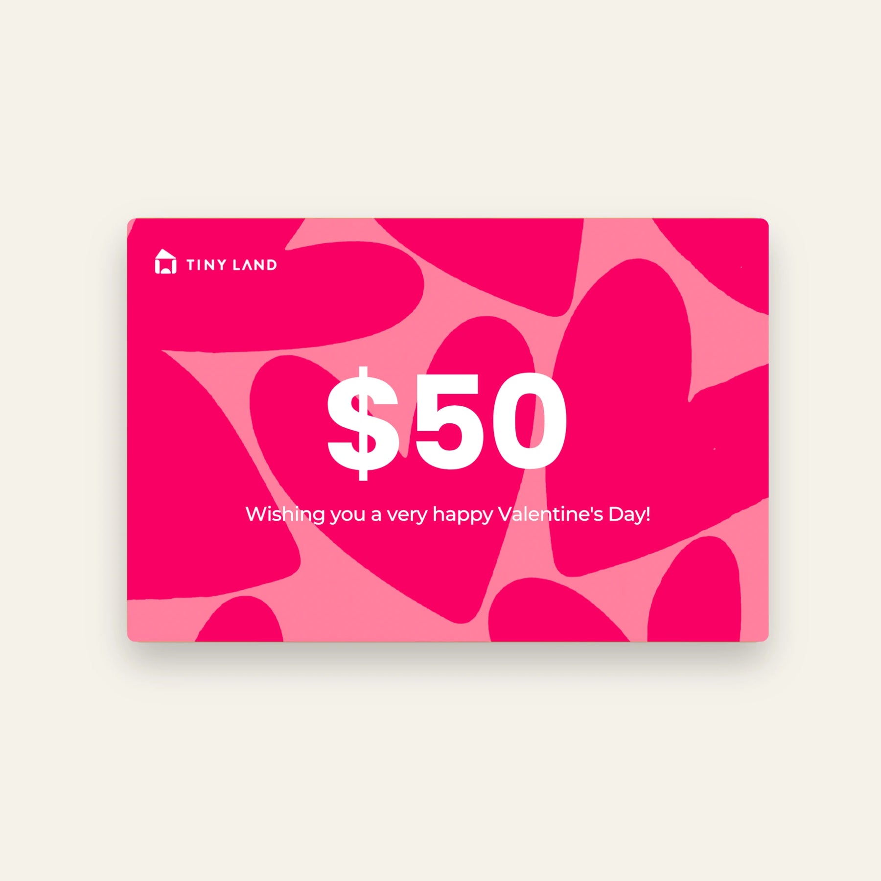 A $50 Tiny Land® Gift Card by Tiny Land, with a pink background and red hearts, featuring "Wishing you a very happy Valentine's Day!"—the perfect online gift to share love.