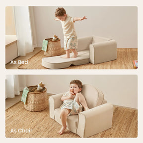 A child enjoys the Tiny Land® GentleSnug Kid Chair - Beige White by Tiny Land, shown as a flat bed and a chair with armrests. Natural light and baskets enhance the cozy room, highlighting this versatile 2-in-1 sofa bed.