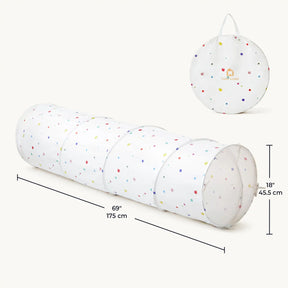 The Tiny Land® Adventure Play Tunnel - Colorful Polka Dots by Tiny Land is shown fully extended with mesh panels and a matching circular carrying case. Dimensions: 69" (175 cm) long, 18" (45.5 cm) high.