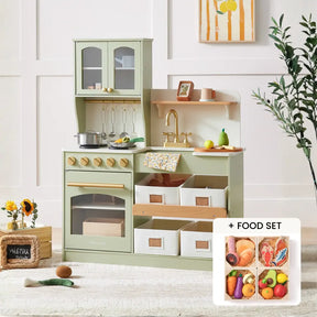 The Tiny Land® Serenity Wooden Kitchen & Wooden Food Set by Tiny Land features a pastel green play kitchen with a stove, oven, sink, and shelves, plus toy utensils, pots, baskets, wooden food pieces, and a small set of toy fruits and veggies.