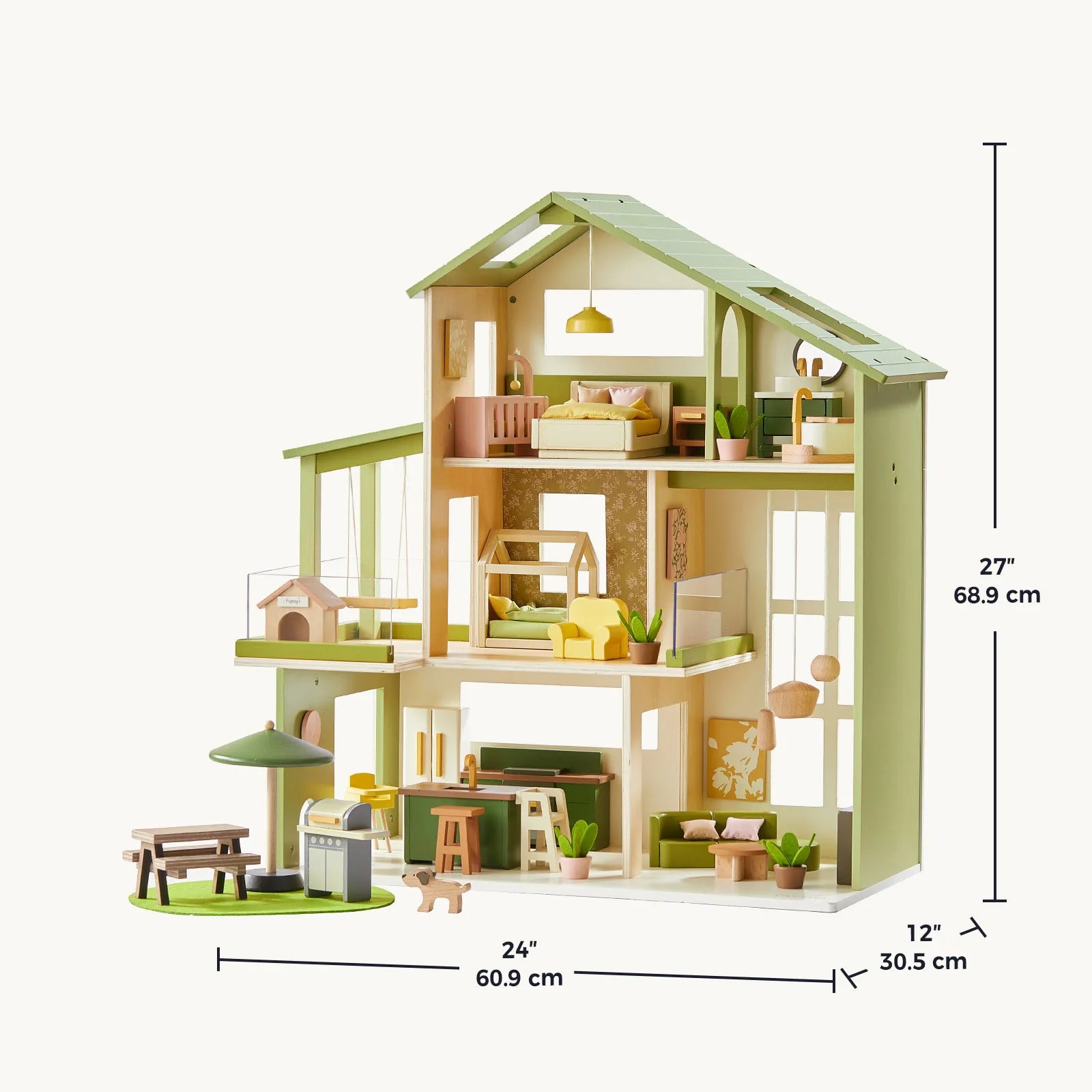 The Tiny Land® Sweetwood Cottage Dollhouse features three levels with furniture and plants, in green and natural wood tones. Dimensions: 24" (60.9 cm) wide, 12" (30.5 cm) deep, 27" (68.9 cm) tall. Brand: Tiny Land.|Green