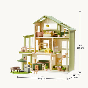 The Tiny Land® Sweetwood Cottage Dollhouse features three levels with furniture and plants, in green and natural wood tones. Dimensions: 24" (60.9 cm) wide, 12" (30.5 cm) deep, 27" (68.9 cm) tall. Brand: Tiny Land.|Green