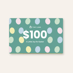 A $100 Tiny Land® Gift Card by Tiny Land, designed with pastel ovals on a green background and "A Little Joy for Easter" in white—an ideal online gift with flexible validity.