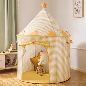 Tiny Land® Kids Tent in yellow and white checkered print with a star topper and an open entrance revealing a cozy reading nook with plush toys and cushions inside.|Yellow