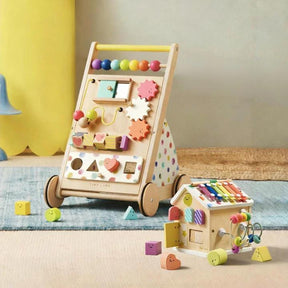 The Tiny Land Rainbow Color Complete Development Playset features a vibrant baby walker and activity cube, designed to boost fine motor skills. Wooden shapes and interactive elements provide hands-on play for curious little learners.