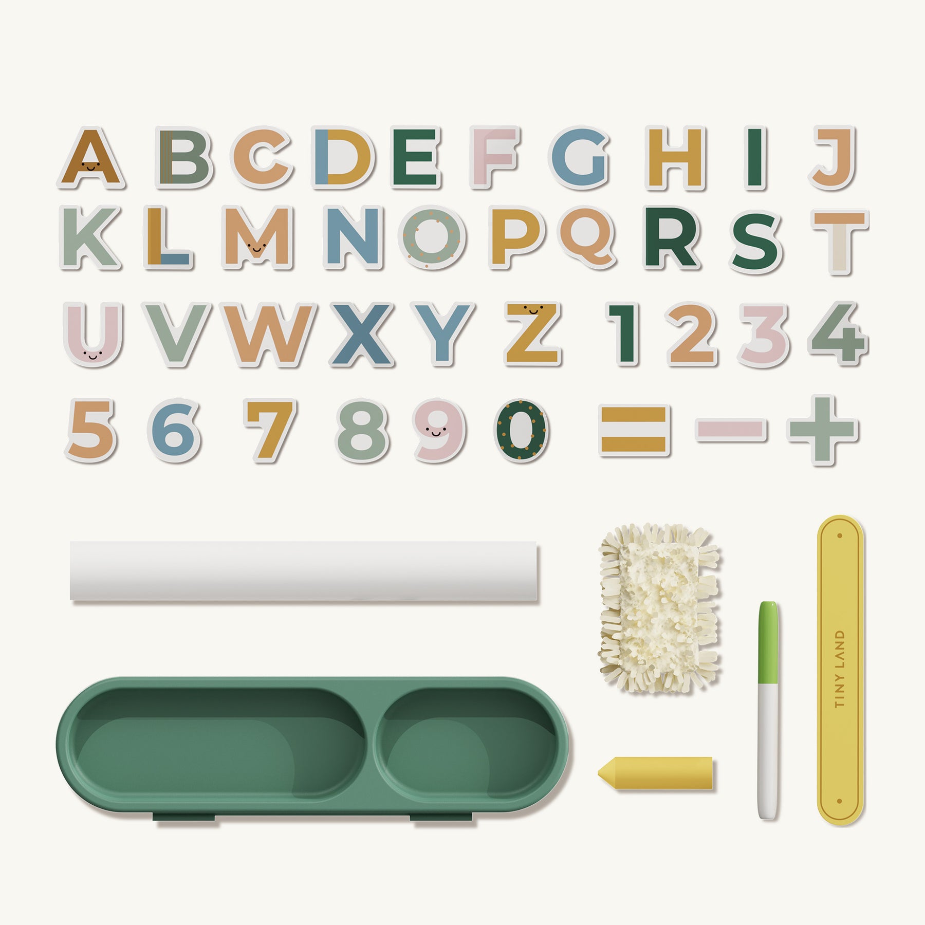 The Tiny Land® Double-Sided Magnetic Tabletop Easel - Green displays alphabet letters A–Z, numbers 1–9, math symbols, and includes a double dish tray, eraser cloth, white chalk, marker, and a yellow ruler—all on a white background.