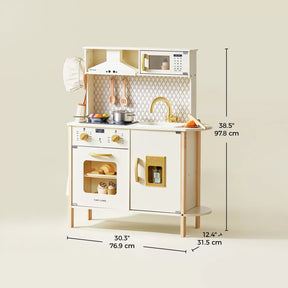 The Tiny Land® PopJoy Play Kitchen by Tiny Land is a stylish cream and gold kids' set with a stove, oven, sink, faucet, microwave, utensils, and chef hat. Sized 38.5" H x 30.3" W x 12.4" D—perfect for pretend play!.