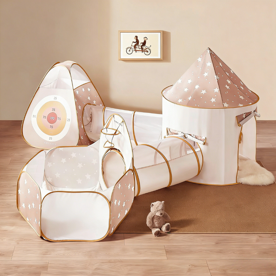 Tiny Land® Discovery 5-in-1 Play Tunnel Set by Tiny Land includes tunnels, a ball pit with target, round tent, and triangular tent. Star patterns decorate the set; teddy bear and wall art create a playful scene (balls not included).