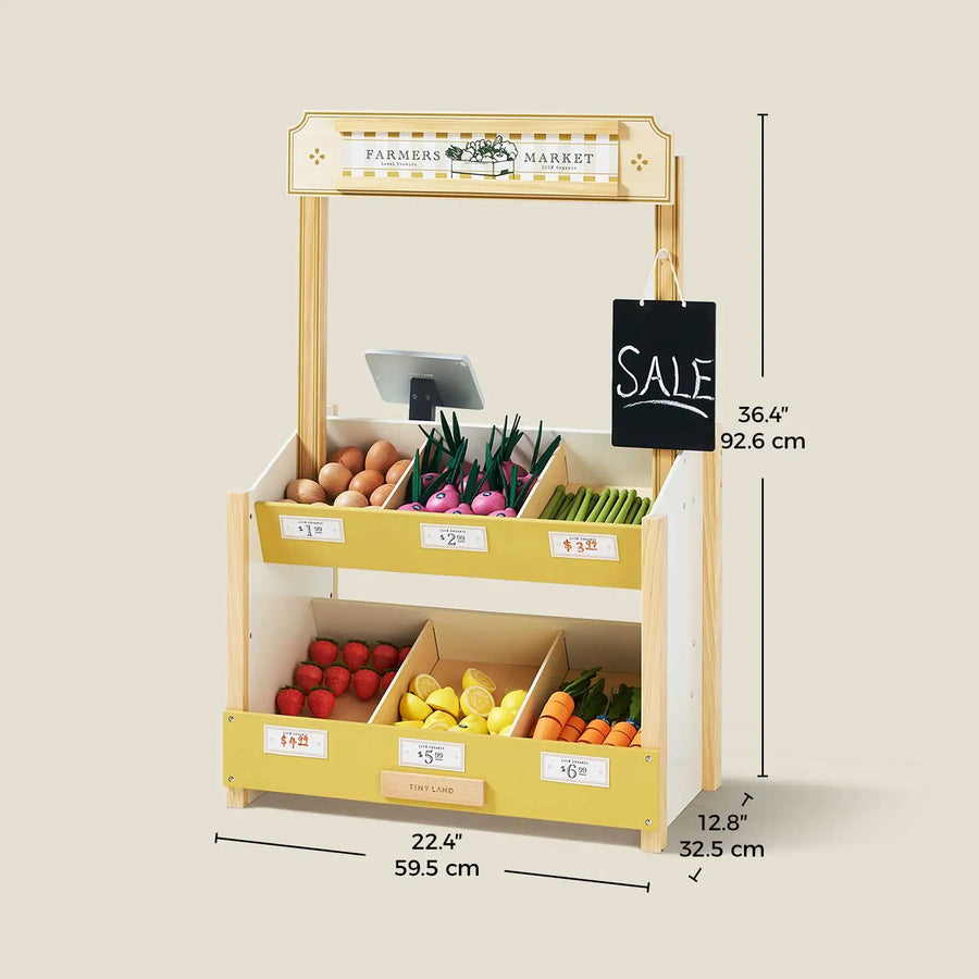 The Tiny Land® Farm-to-Table Gift Set by Tiny Land is a wooden kitchen & market stall with pretend fruits, veggies, price labels, a “SALE” chalkboard, light & sound features, and measures 36.4" H x 22.4" W x 12.8" D (92.6x59.5x32.5 cm).