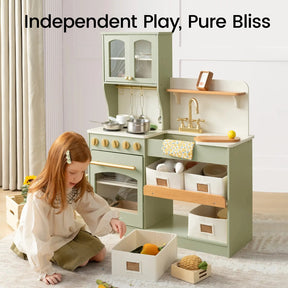 A young girl enjoys imaginative play with the Tiny Land® Wooden Play Kitchen with Storage for Creative Toddlers by Tiny Land, surrounded by organized storage bins and a variety of toy food. The text above reads, "Independent Play, Pure Bliss." Colorful curtains frame the scene as she stirs up make-believe meals using pretend cookware.|sage