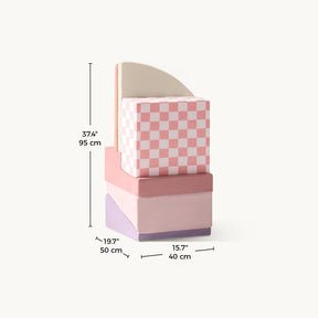 The Tiny Land® PlayNest Climbing Blocks by Tiny Land include four colorful foam pieces—pink, purple, cream, and checkered—that stack into a chair shape. Sized 37.4” tall, 19.7” deep, and 15.7” wide—perfect for toddlers to climb and play.