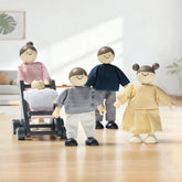 The Tiny Land® Wooden Dollhouse Dolls from Tiny Land include five natural wood figures with simple faces. One doll pushes a stroller with a baby inside. The poseable family wears pastel outfits, perfect for modern dollhouse playrooms.