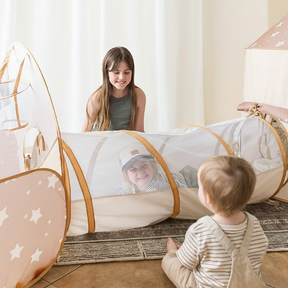 Children playing in mesh tunnel without text