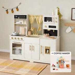 The Tiny Land® Iconic Wooden Play Kitchen Bundle Set by Tiny Land features a white wooden kitchen with gold accents, yellow curtains, stove, oven, sink, microwave, shelves, plus an inset toy coffee maker set with cups and accessories.