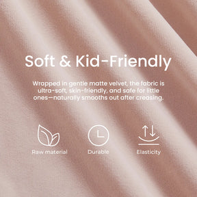 Close-up of the Tiny Land® GentleSnug Kid Chair’s soft, light pink matte velvet fabric—kid-friendly, ultra-soft, skin-friendly, durable, and elastic—crafted from quality raw materials. Perfect for use on a foldable kids’ sofa or 2-in-1 sofa bed with high-density foam. Three simple icons highlight these features.|Pink